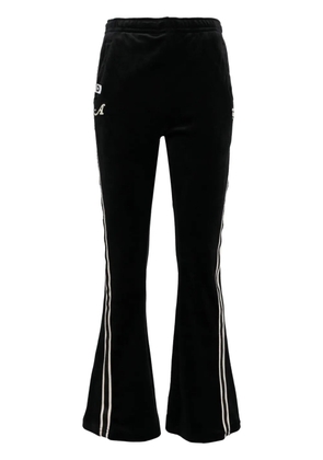 A BATHING APE® logo-patch flared trousers - Black
