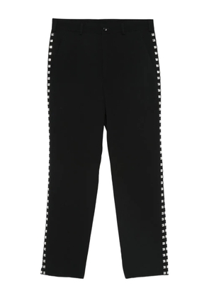 Black Comme Des Garçons wool trousers