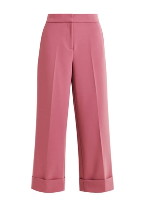 Essentiel Antwerp pressed-crease flared trousers - Pink