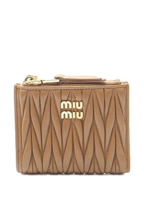 Miu Miu Pre-Owned 2010s matelasse bi-fold leather wallet - Neutrals