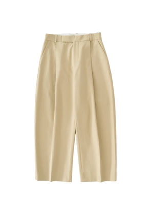 Studio Nicholson pleated tab-fastening pull trousers - Neutrals