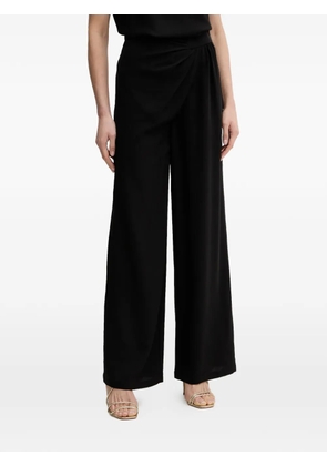 SIMONA CORSELLINI black trousers
