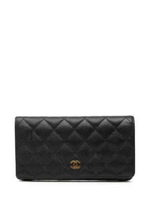CHANEL Pre-Owned 2014 CC Quilted Caviar Yen Wallet long wallets - Black