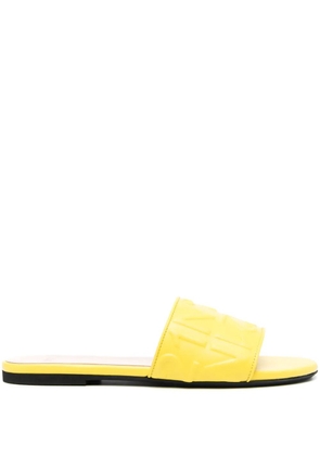 Nº21 logo-embossed leather slides - Yellow