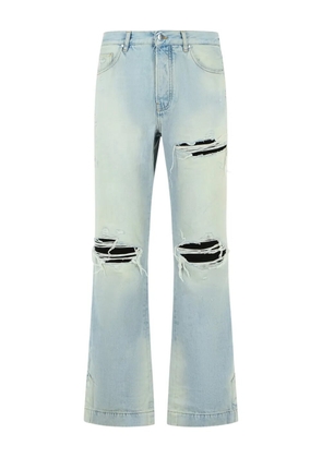 AMIRI distressed-effect flared jeans - Blue