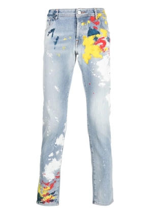 Philipp Plein paint-splatter print jeans - Blue