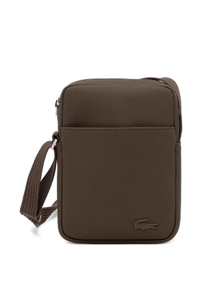 Lacoste textured logo cross body bag - Brown