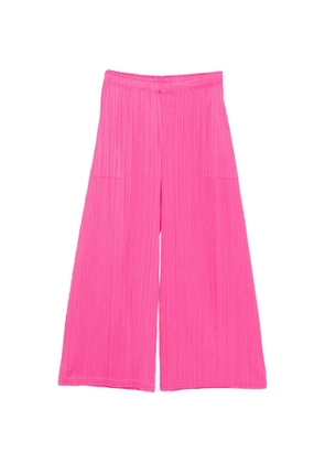 Pleats Please Issey Miyake Monthly Colors: January plissé wide-leg trousers - Pink