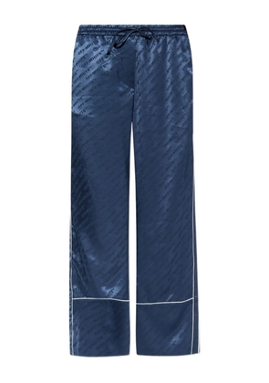 Off-White logo-pattern piped trousers - Blue