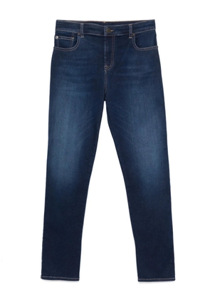 Emporio Armani logo-patch jeans - Blue