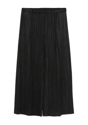Pleats Please Issey Miyake pleated trousers - Black
