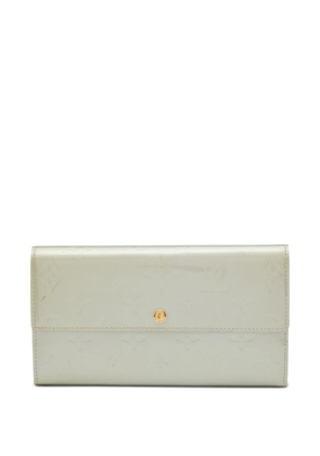 Louis Vuitton Pre-Owned monogram-debossed leather wallet - Grey