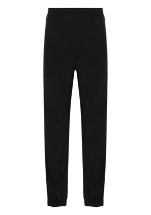 MSGM logo-embroidered tapered trousers - Black