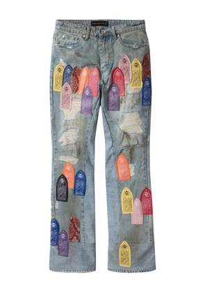 Who Decides War Patch Arched Repaired jeans - Blue