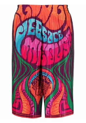 Versace logo-print pleated shorts - Orange