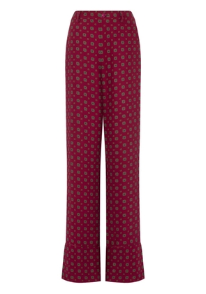 Moschino geometric-print trousers - Red
