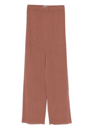 Issey Miyake Hatching Pleats trousers - Brown