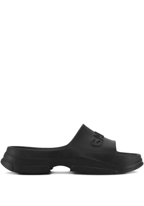 GANNI logo-embossed chunky slides - Black
