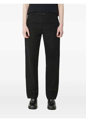 Carhartt WIP logo-patch trousers - Black