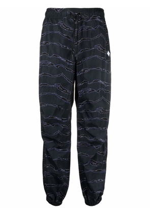 COUNTY OF MILAN graphic-print track pants - Blue