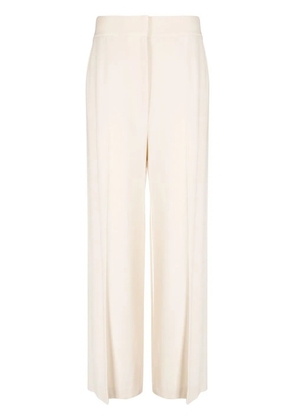 KHAITE high-waisted wide-leg trousers - Neutrals