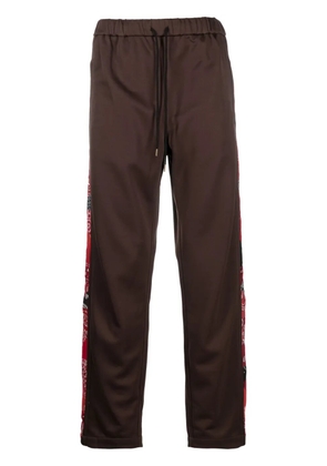 Children Of The Discordance bandana-panel track pants - Brown