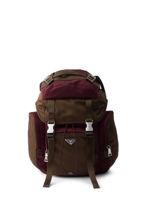 Prada logo-plaque buckled backpack - Brown
