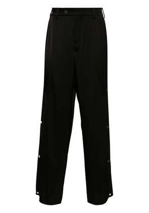 AMIRI logo-plaque straight-leg trousers - Black