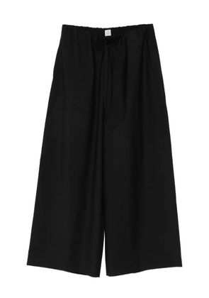 TOTEME Dinner drawstring wool trousers - Black