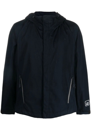 C.P. Company logo-patch zipped hooded jacket - Blue