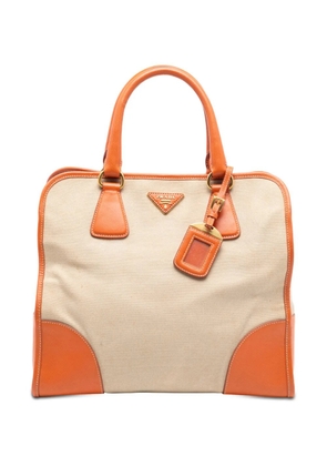 Prada Pre-Owned 2010-2025 Saffiano Trimmed Canvas Canapa satchel - Brown