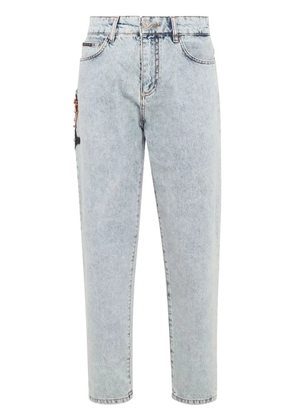 Philipp Plein appliqué-detail tapered jeans - Blue
