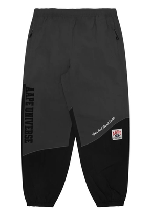 AAPE BY *A BATHING APE® logo-print cargo trousers - Black