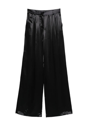 THE ANDAMANE pleat-detail trousers - Black