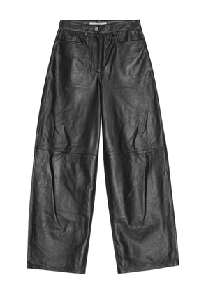 REMAIN sheepskin panelled straight-leg trousers - Black