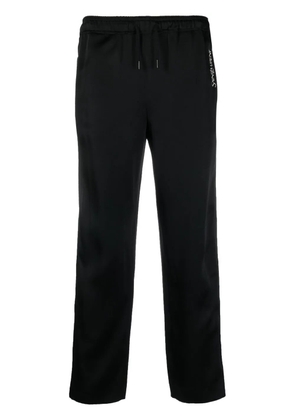 Saint Laurent embroidered-logo striped track pants - Black