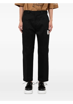 Maison MIHARA YASUHIRO label-detail trousers - Black