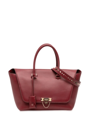 Valentino Garavani Pre-Owned 2000-2025 Leather Rockstud Demilune satchel - Red