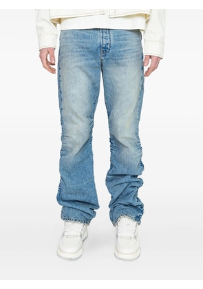 B1ARCHIVE stacked-leg jeans - Blue
