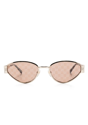 Gucci Eyewear GG-motif sunglasses - Gold