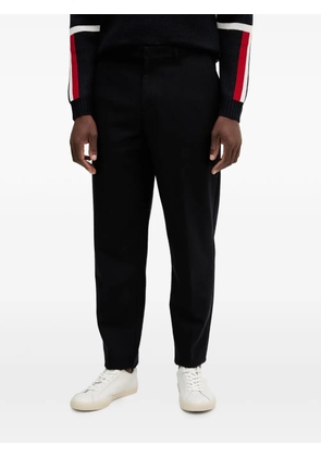 Armani Exchange logo-plaque trousers - Black