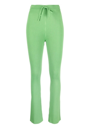 Nanushka Cornelie ribbed-knit flared trousers - Green