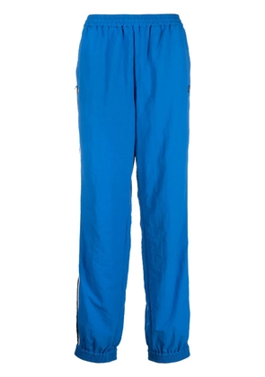 AMBUSH stripe-detailing logo-print track pants - Blue