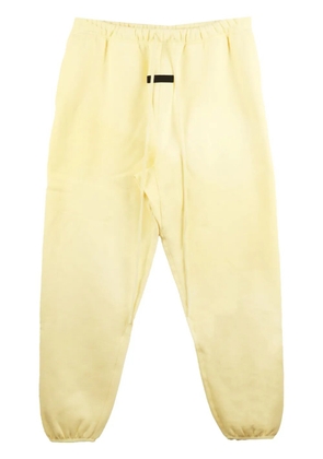 FEAR OF GOD ESSENTIALS Essentials logo-appliqué track pants - Yellow