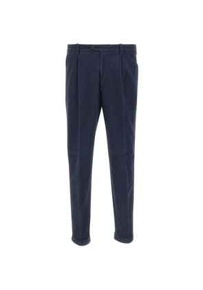 DEVORE pleated-details trousers - Blue