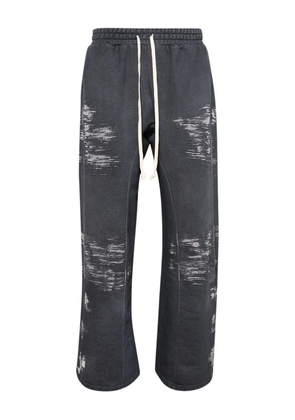 RRR123 Burn The Man drawstring-fastening print trousers - Grey