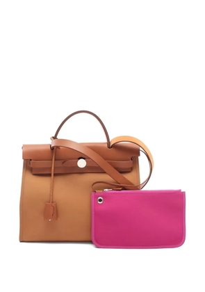 Hermès Pre-Owned 2021 leather zip tote bag - Neutrals