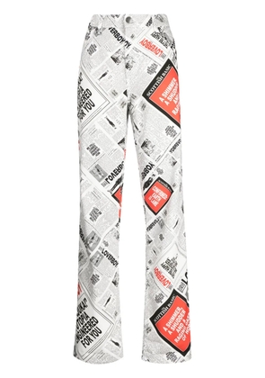 Charles Jeffrey Loverboy newspaper-print wide-leg jeans - White
