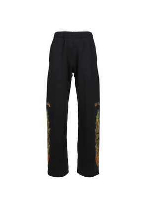 We11done flame-graphic track pants - Black