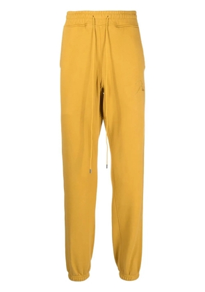 RHUDE embroidered-logo drawstring track pants - Yellow